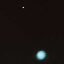 Neptune with Triton - its largest moon