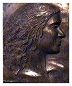 portrait plaque ,cast polymer plaster; young woman/