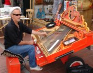 Paul Harrison playing his X Piano on the street in North Laine, Brighton